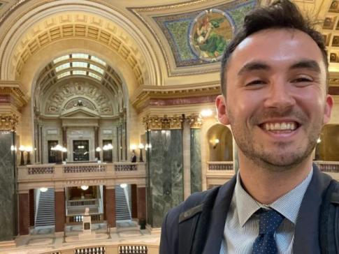 Free Press Action’s Alex Frandsen at the Wisconsin statehouse to celebrate the introduction of legislation designed to strengthen local journalism.