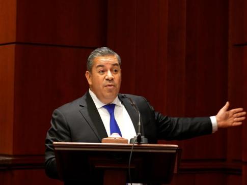 Ray Lujan speaking at a briefing.