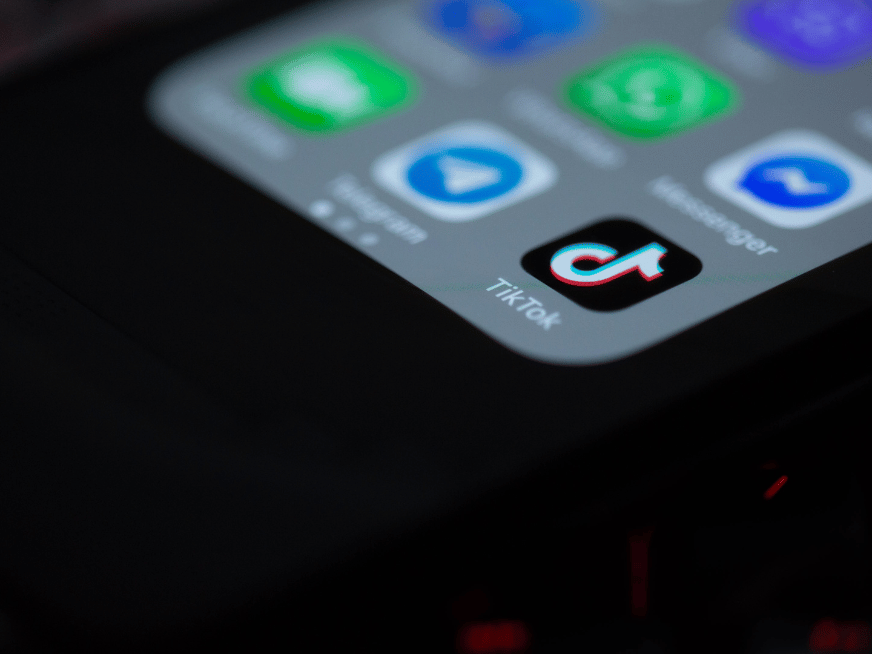 A photograph of the tiktok app icon on a smart phone